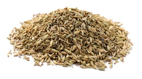 Photo of Pile of dry fennel seeds isolated on white