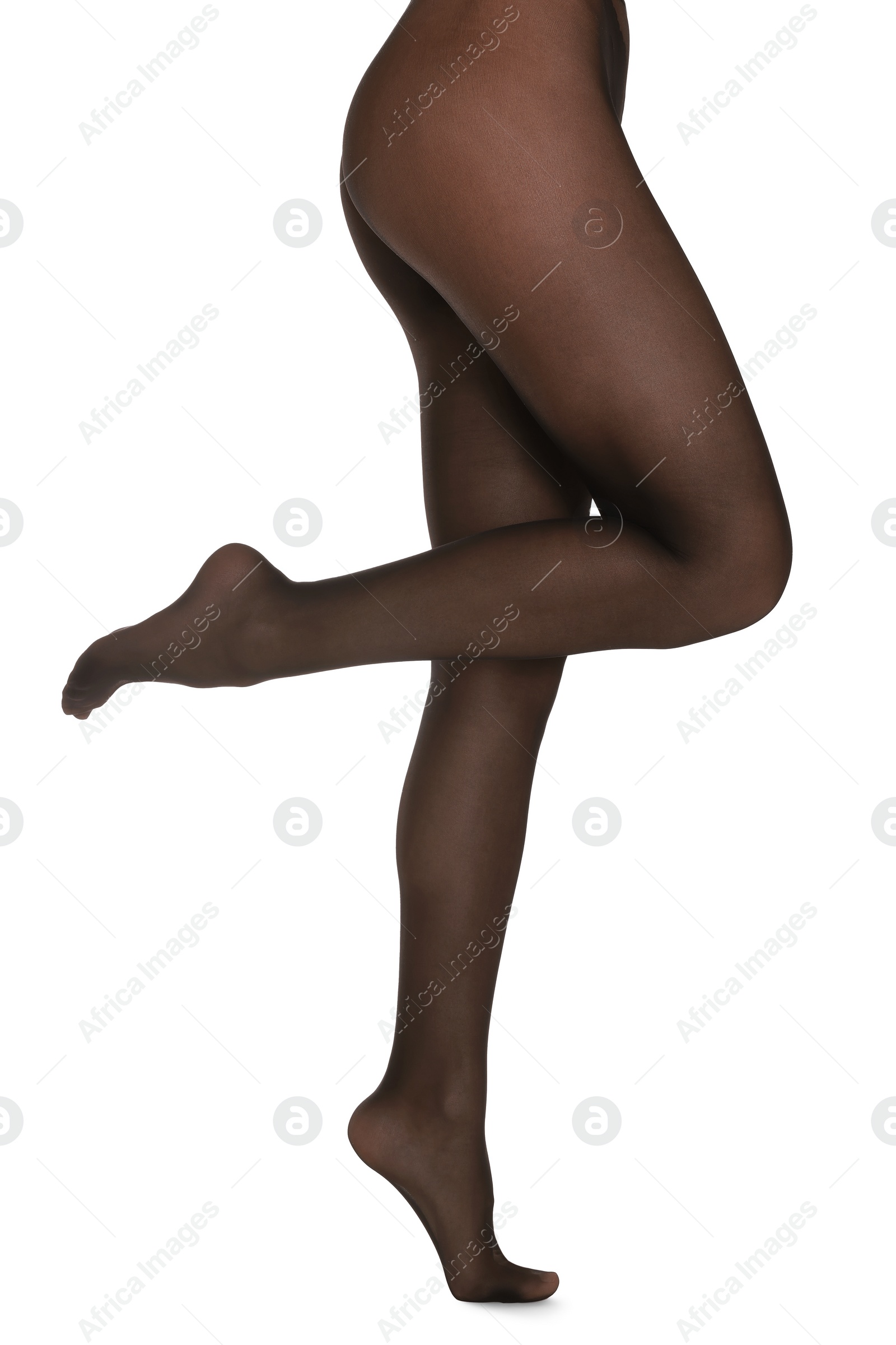 Photo of Woman with beautiful long legs wearing black tights on white background, closeup