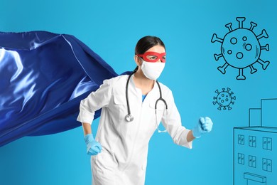 Image of Doctor wearing face mask and superhero costume ready to fight against viruses on light blue background