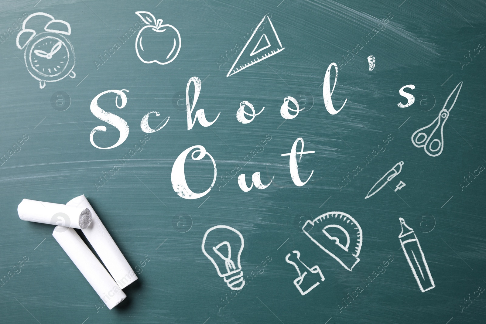 Image of Pieces of white chalk and text SCHOOL'S OUT written on greenboard, flat lay