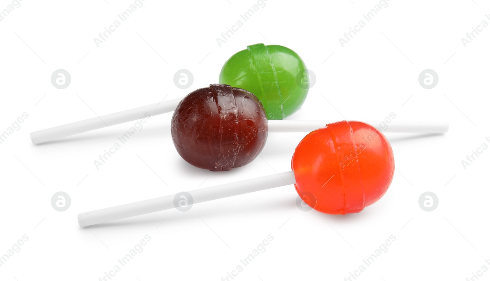 Photo of Different delicious colorful candies on white background