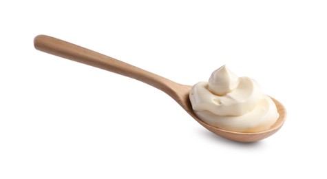 Photo of Natural yogurt in wooden spoon isolated on white