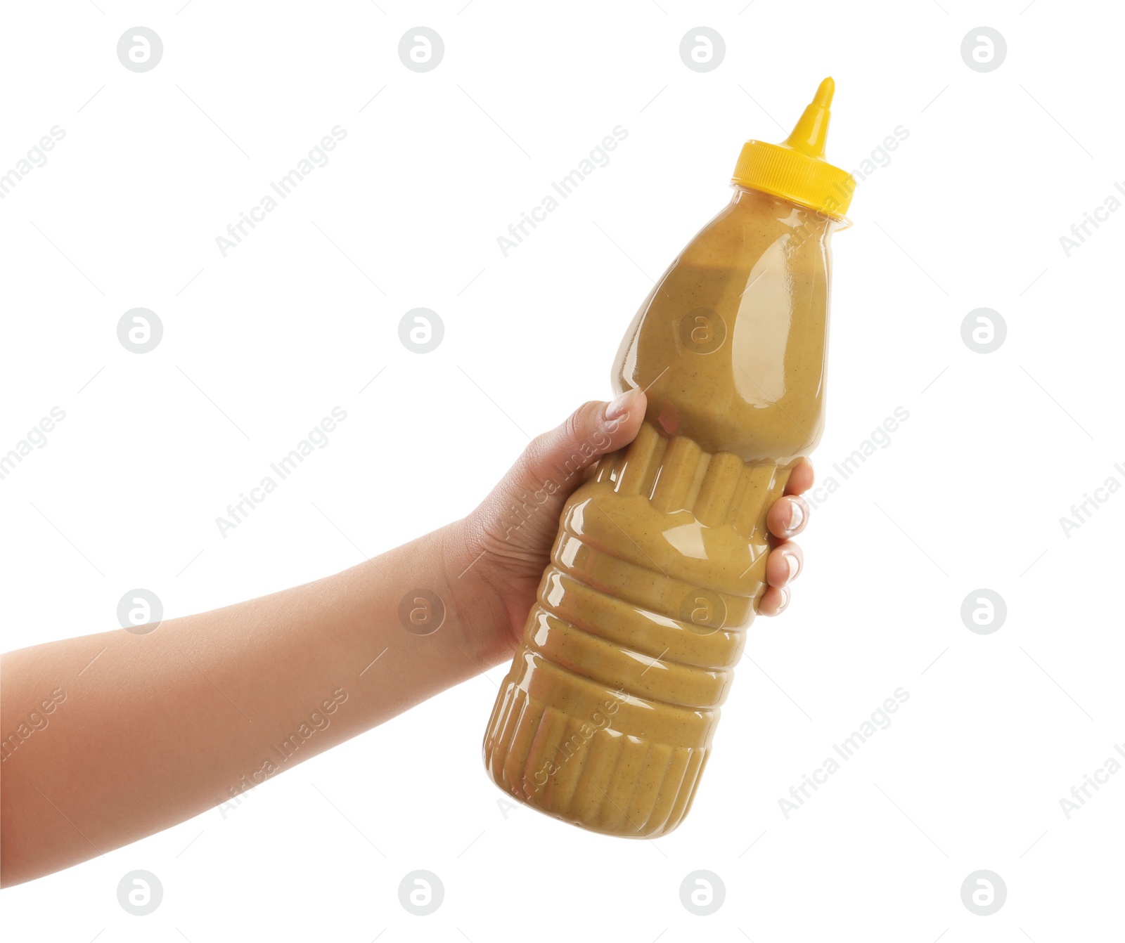 Photo of Woman with bottle of mustard on white background, closeup