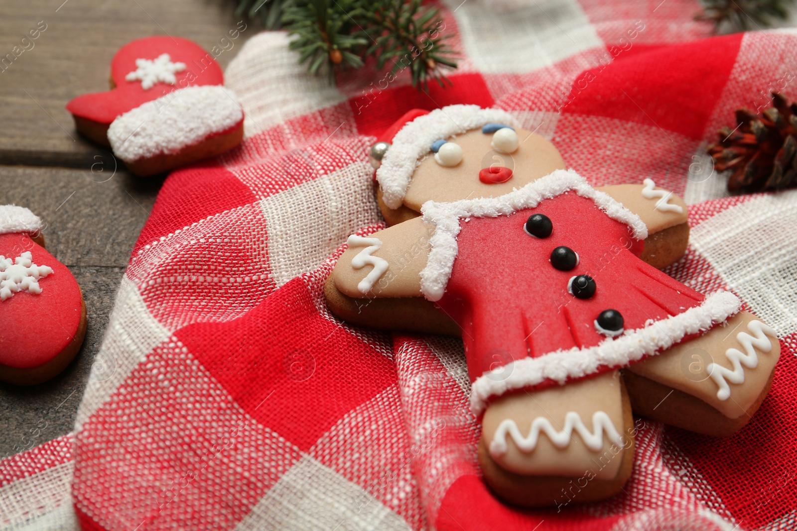 Photo of Delicious Christmas cookies on wooden table, closeup
