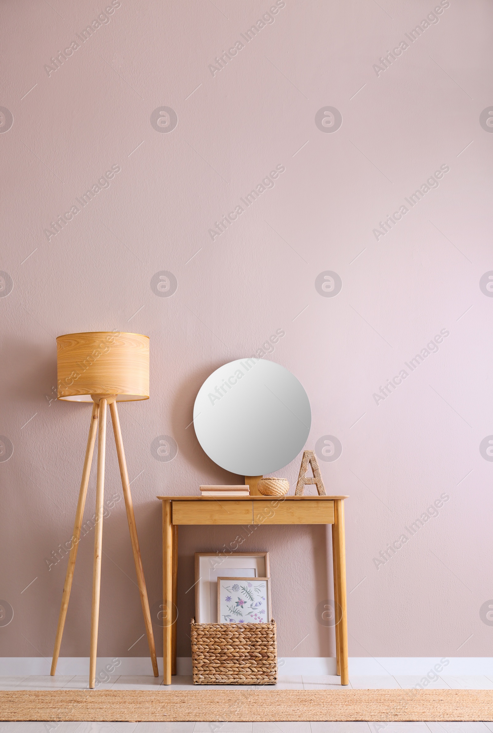 Photo of Elegant room interior with console table and floor lamp