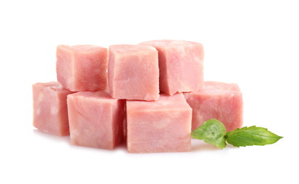 Photo of Cubes of tasty fresh ham with basil isolated on white