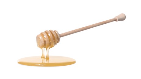 Photo of Natural honey dripping from dipper on white background