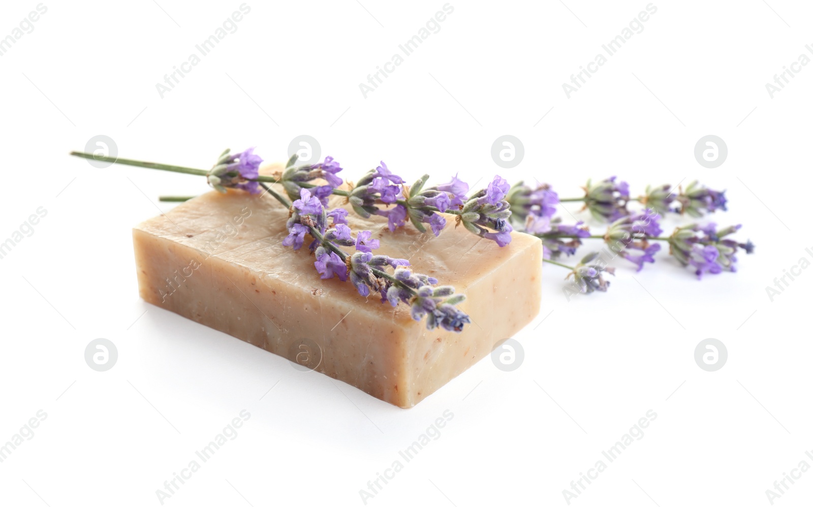 Photo of Hand made soap bar with lavender flowers on white background