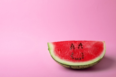 Photo of Watermelon with funny smiling face on color background. Space for text