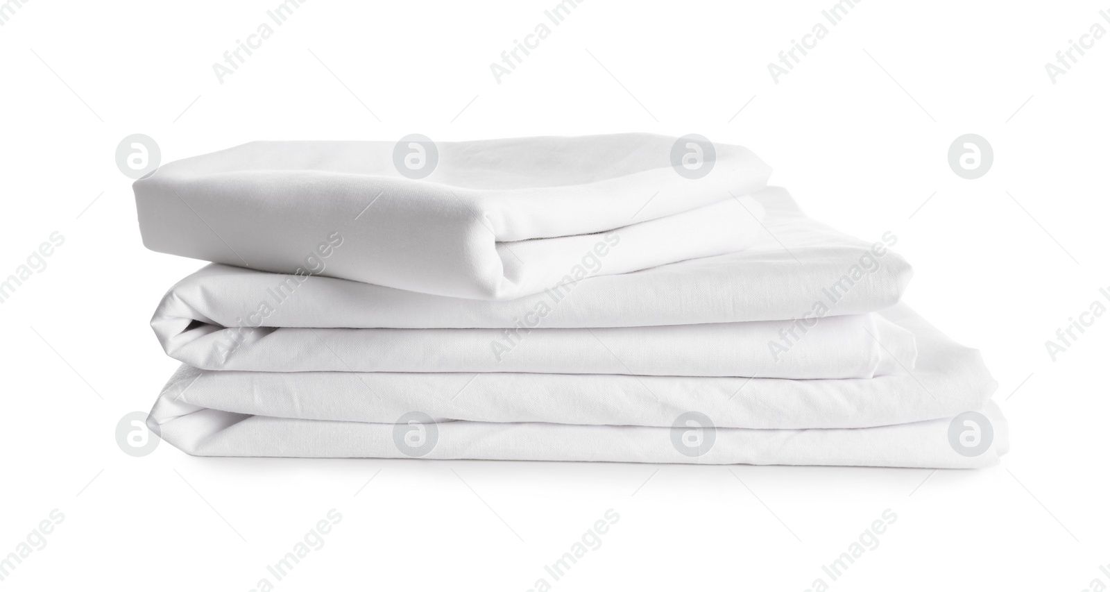 Photo of Stack of clean bed linen isolated on white