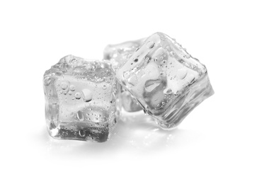 Photo of Crystal clear ice cubes on white background