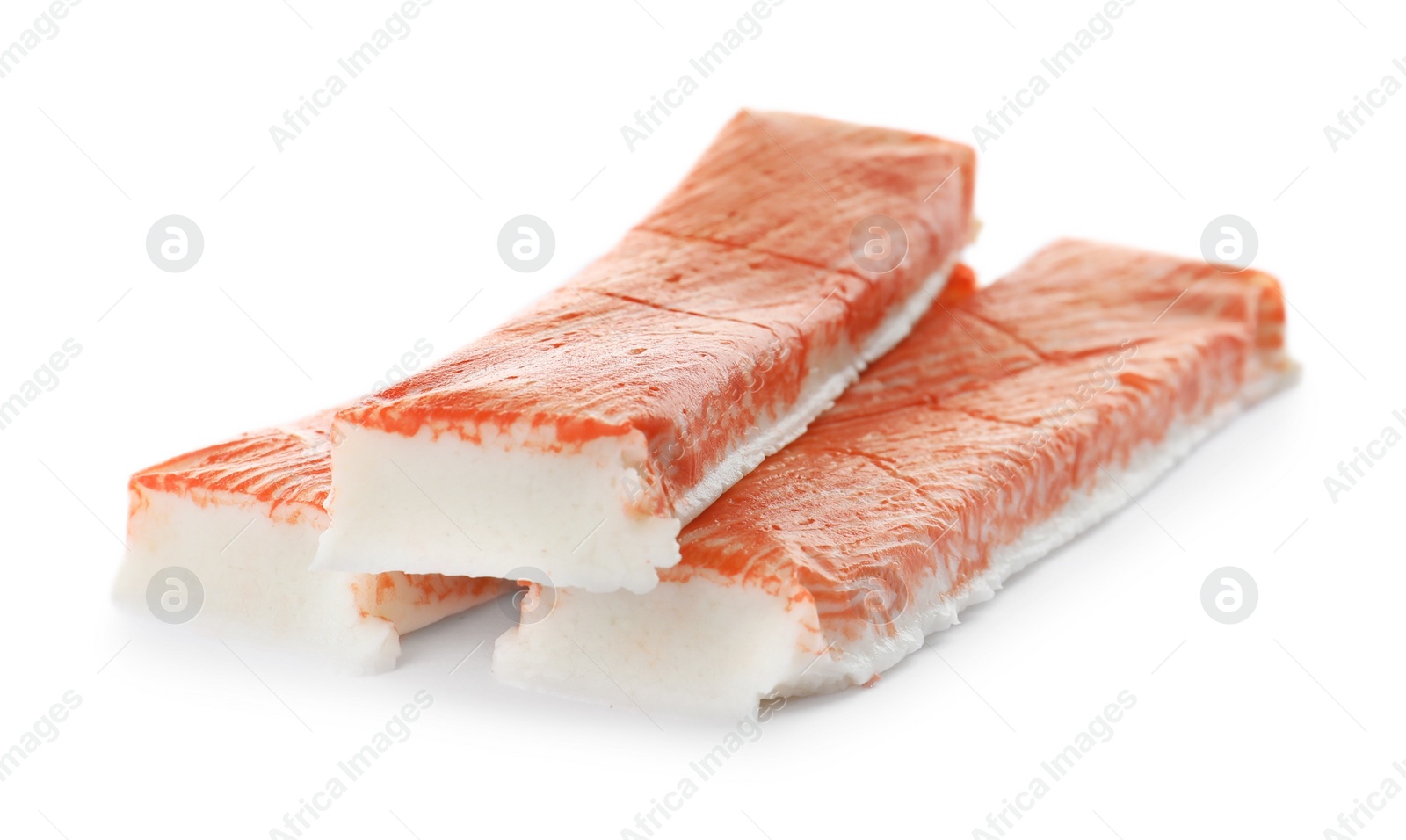 Photo of Delicious fresh crab sticks isolated on white