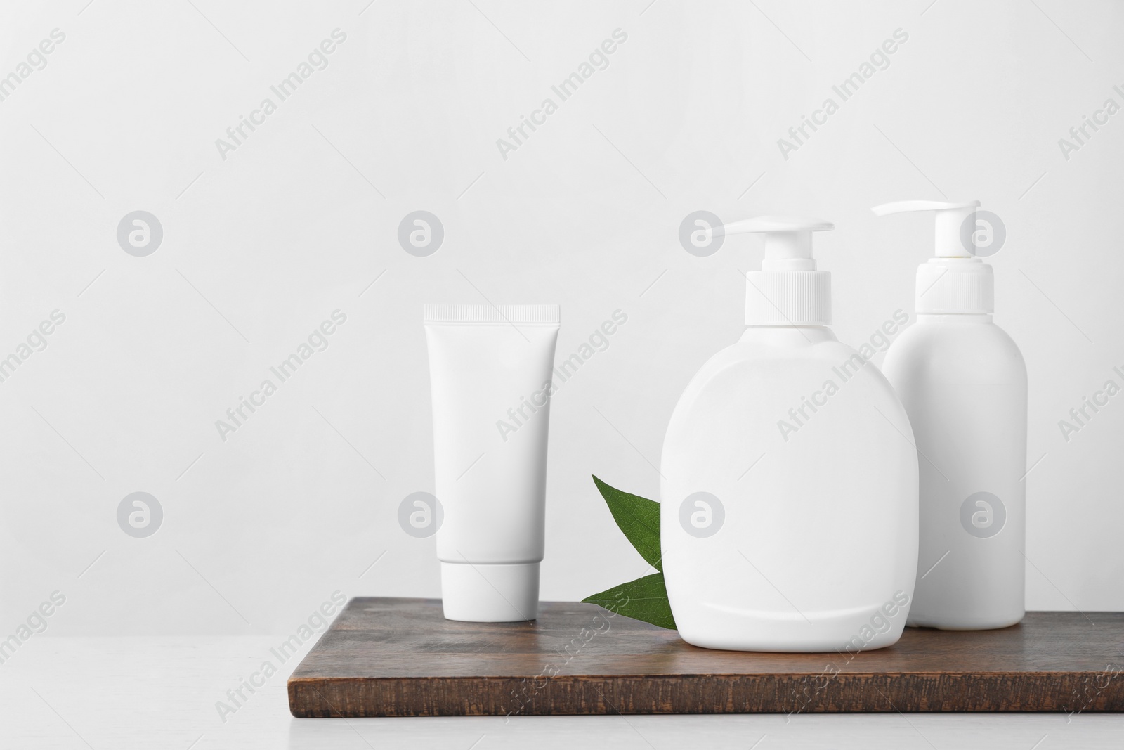 Photo of Different cosmetic product on white table. Space for text