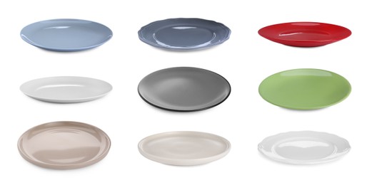 Image of Set of different ceramic plates on white background