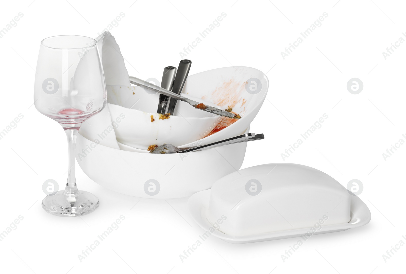 Photo of Set of dirty dishes isolated on white