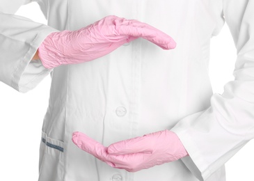 Photo of Doctor in uniform and medical gloves, closeup