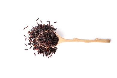 Photo of Spoon with uncooked black rice on white background, top view