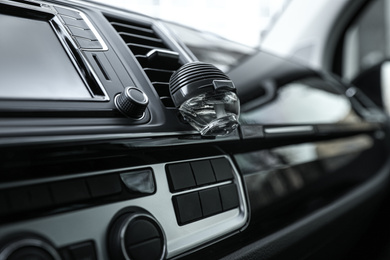 Stylish air freshener clip attached to car ventilation