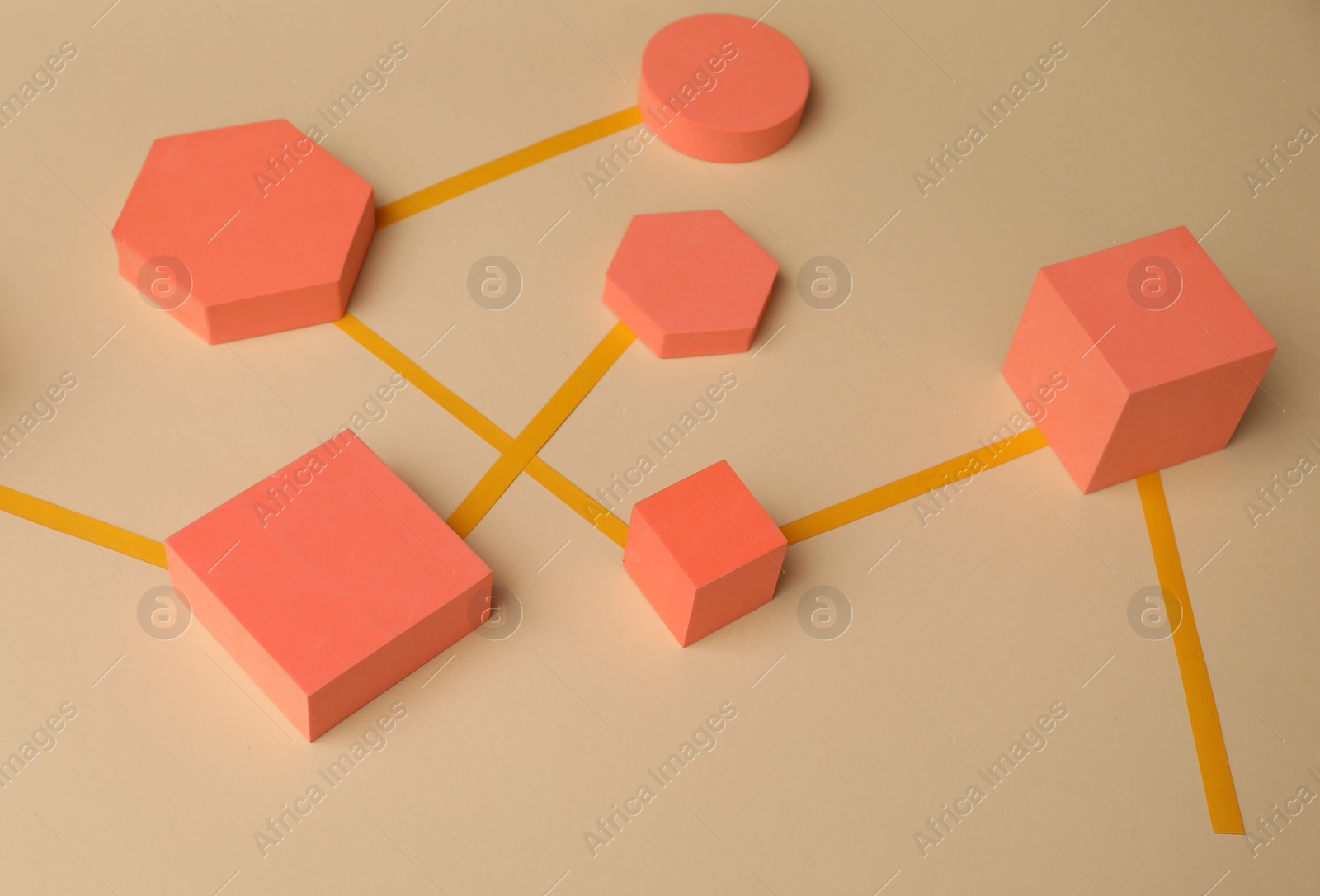 Photo of Business process organization and optimization. Scheme with geometric figures on beige background