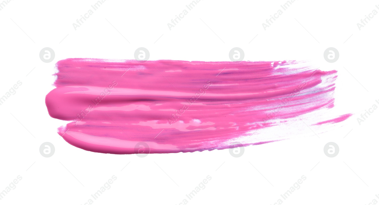 Photo of Abstract brushstroke of pink paint isolated on white