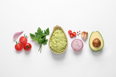 Fresh ingredients for guacamole on white background, flat lay