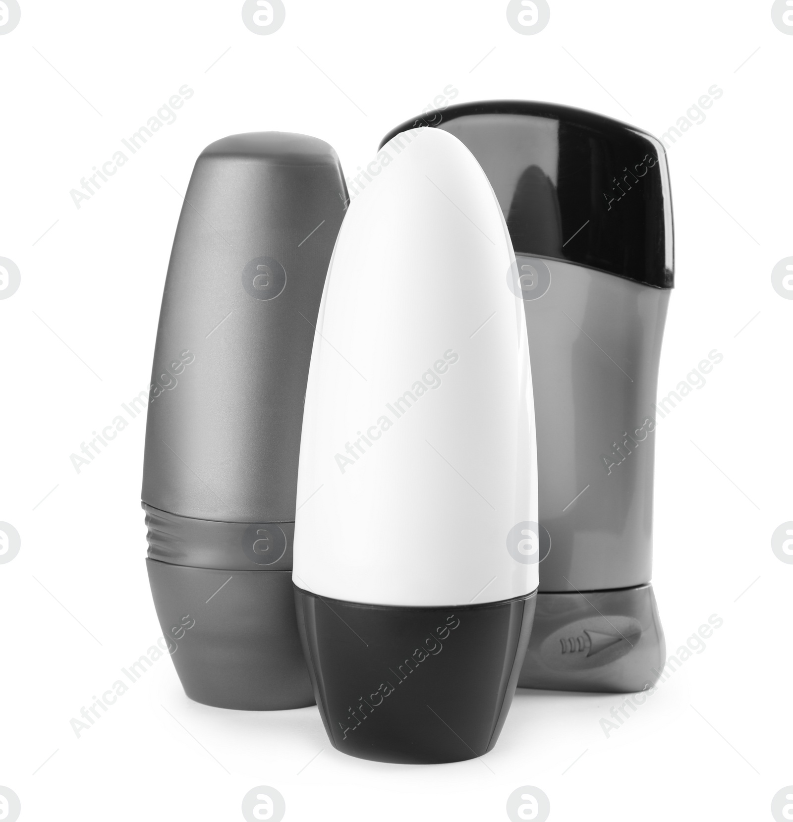 Photo of Different male deodorants on white background. Skin care