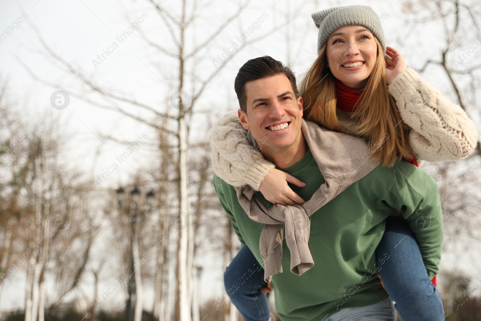 Photo of Beautiful happy couple outdoors on winter day