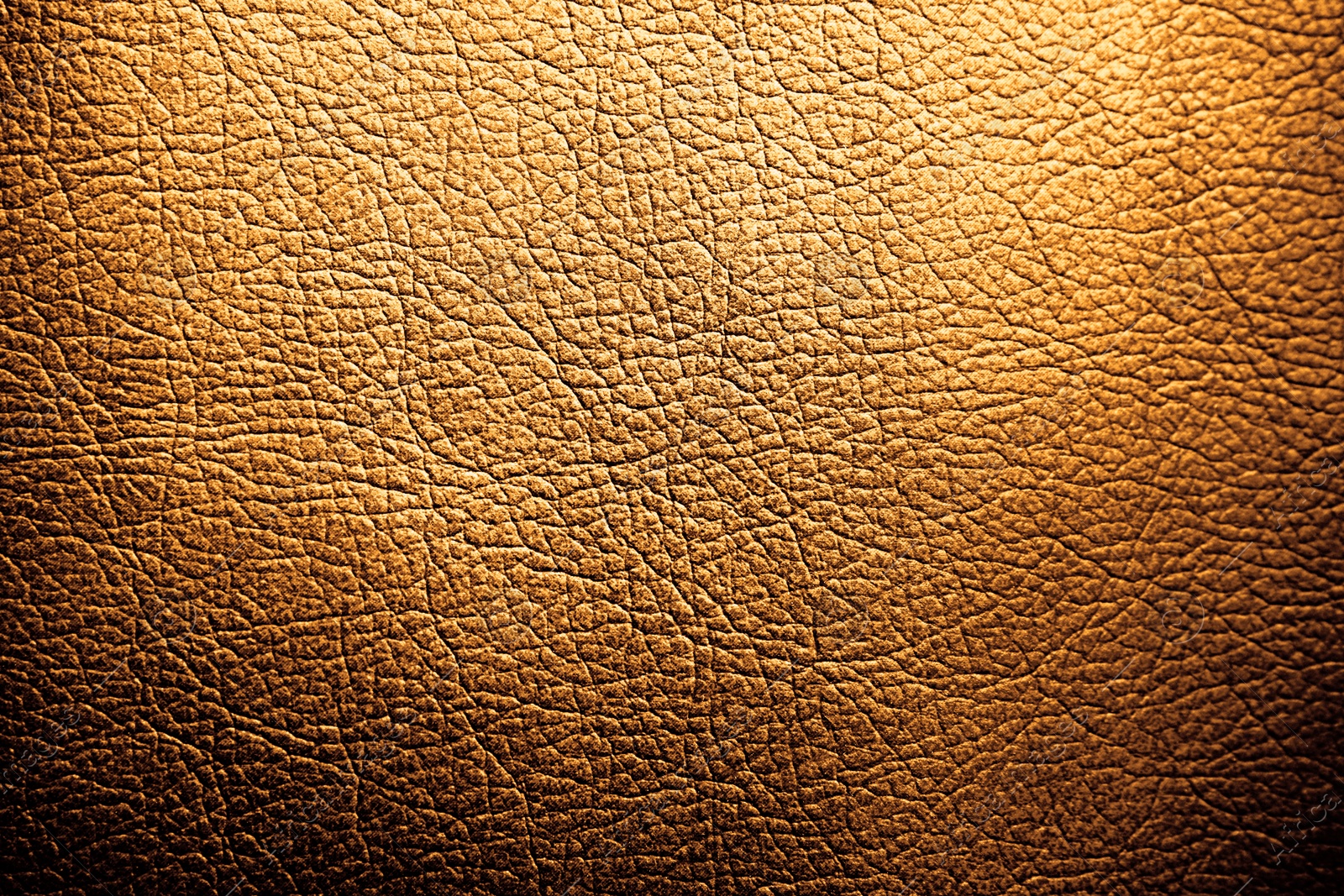 Image of Golden textured surface as background, closeup view