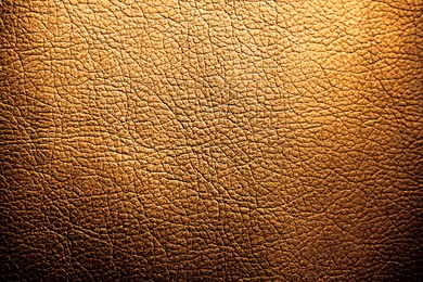 Image of Golden textured surface as background, closeup view