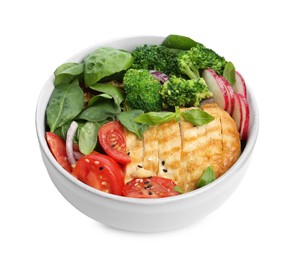 Photo of Healthy meal. Delicious chicken, vegetables and spinach in bowl isolated on white