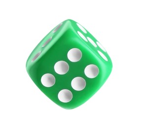 Photo of One green game dice isolated on white