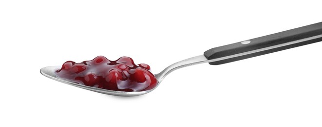 Spoon with fresh cranberry sauce isolated on white