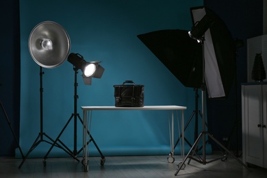 Photo of Shooting of men's bag for product promotion in photo studio