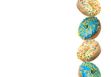 Image of Many different tasty donuts on white background