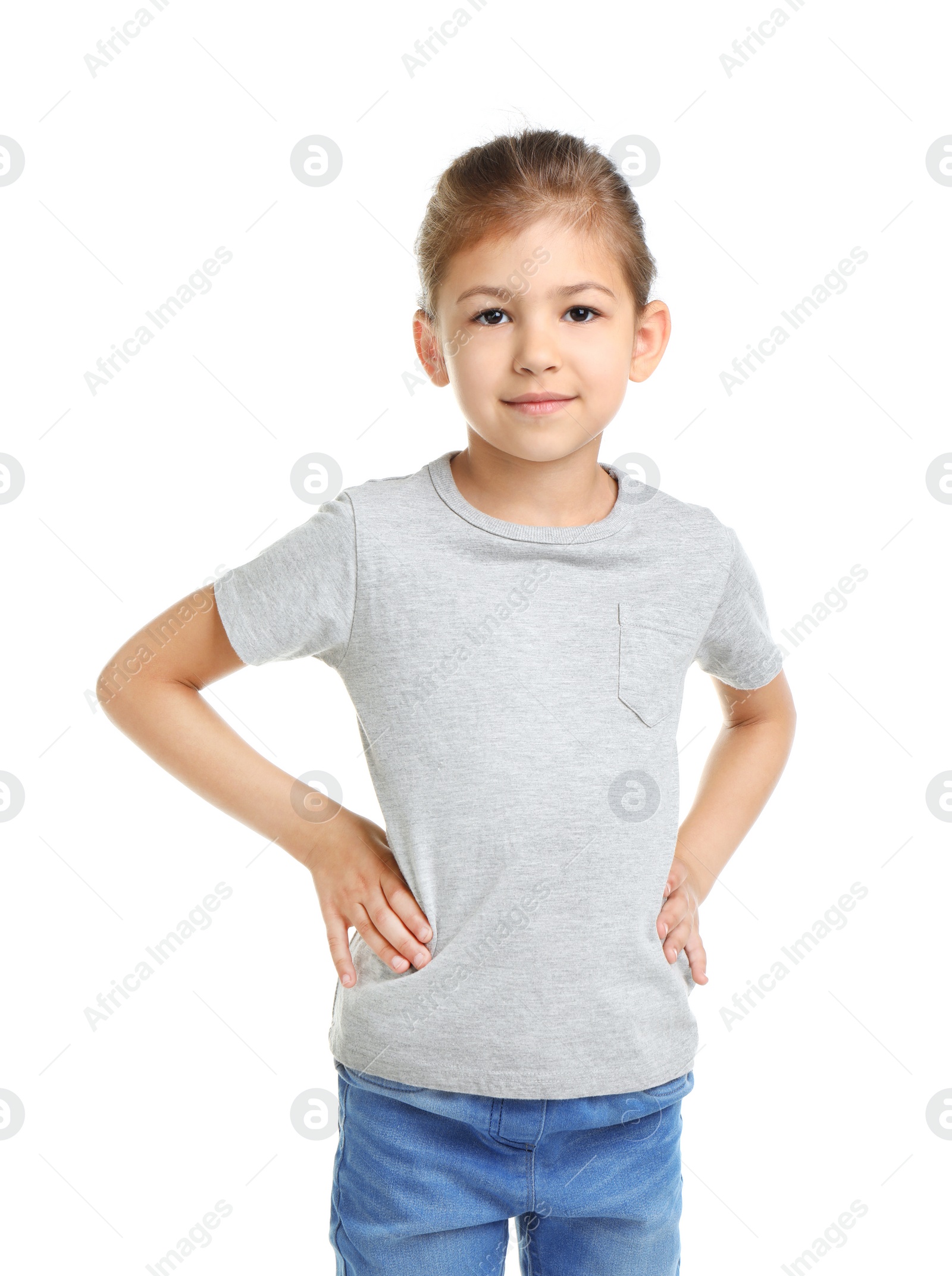 Photo of Little girl in t-shirt on white background. Mockup for design