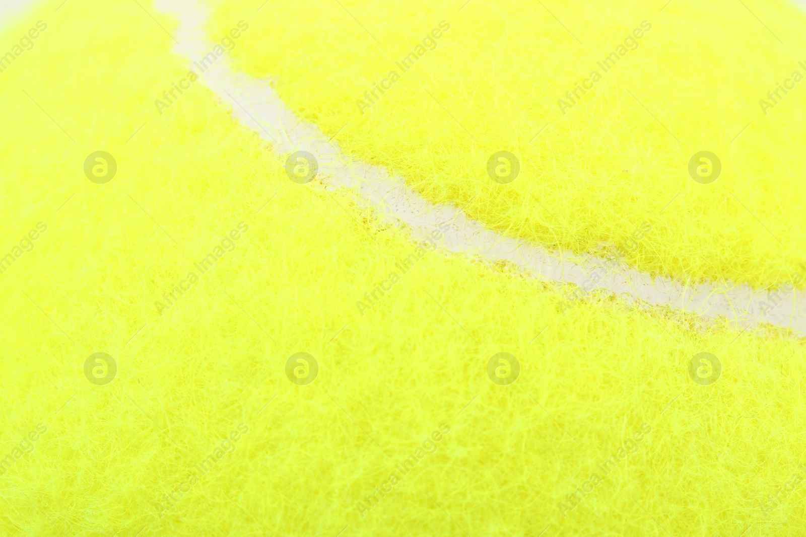 Photo of One tennis ball as background, closeup view