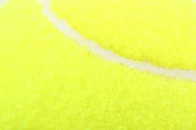One tennis ball as background, closeup view