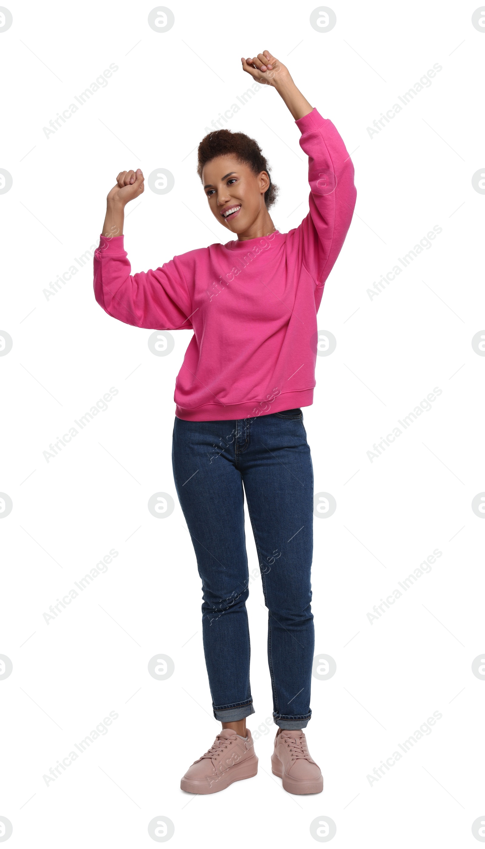 Photo of Happy young woman dancing on white background