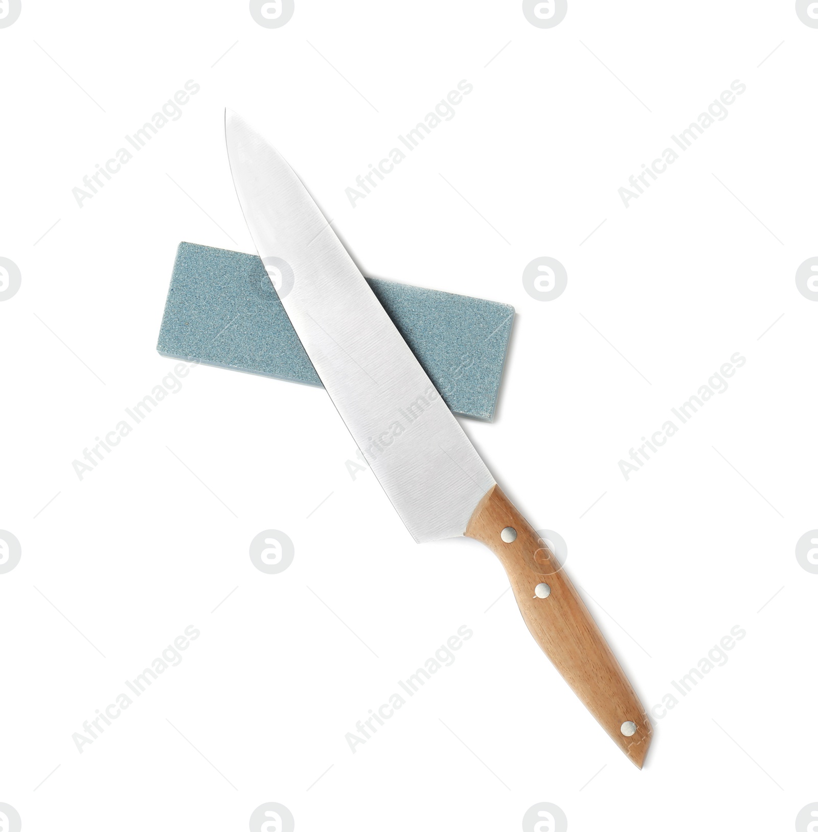 Photo of Chef's knife and grindstone isolated on white, top view