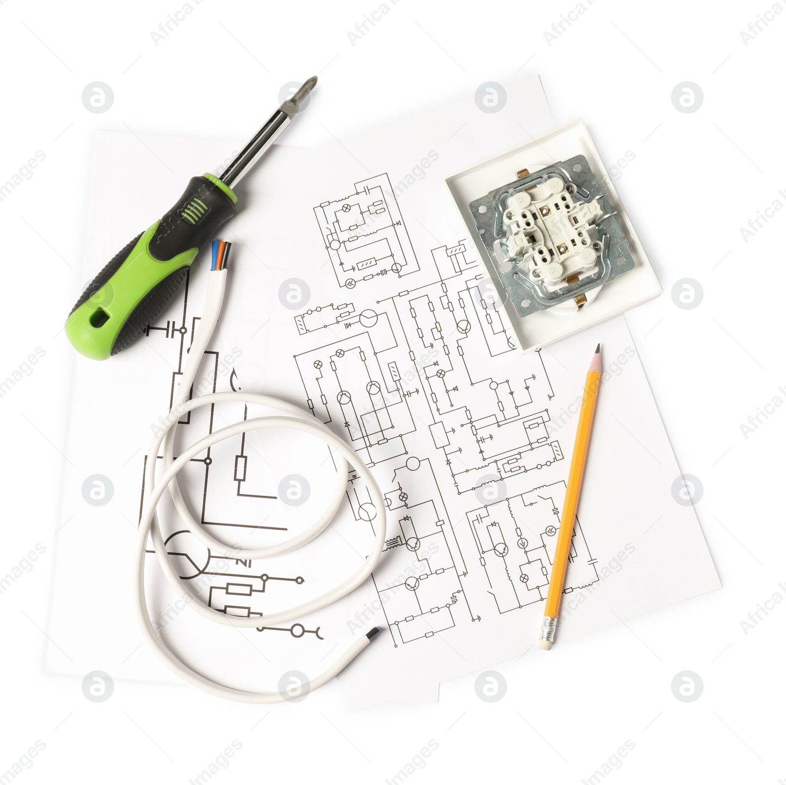 Photo of Wiring diagrams, screwdriver and disassembled light switch isolated on white, top view