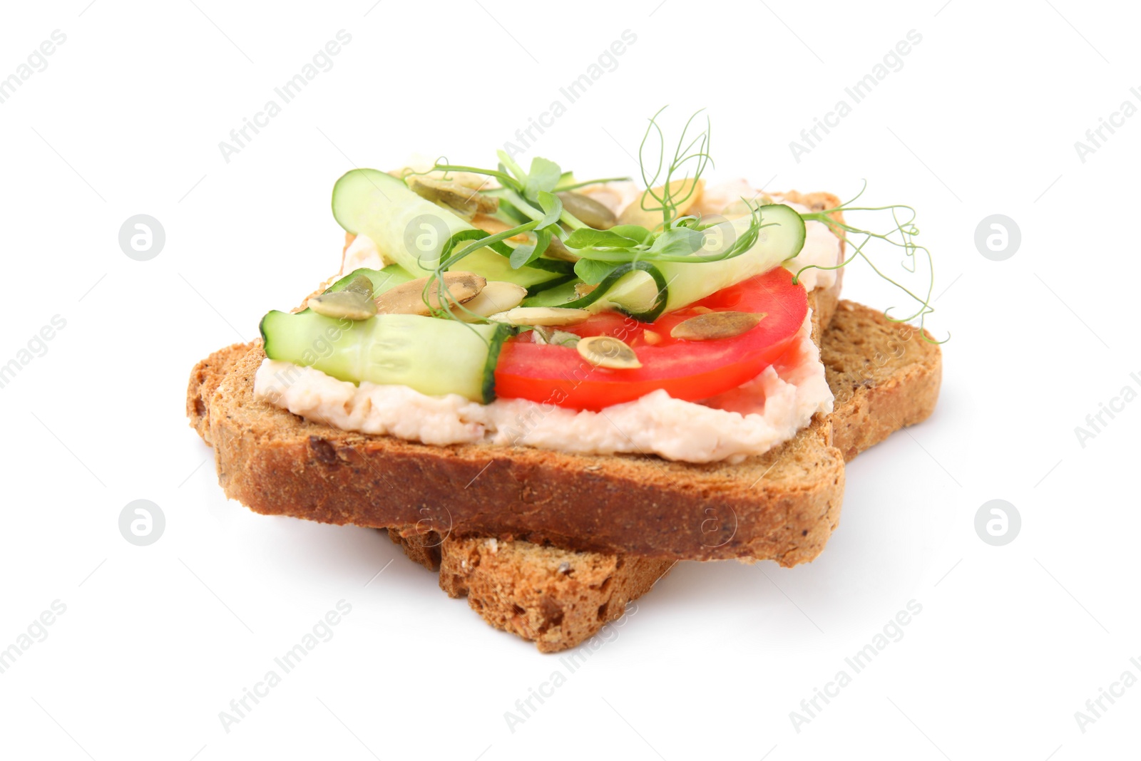 Photo of Tasty vegan sandwich with cucumber, tomato and pumpkin seeds isolated on white