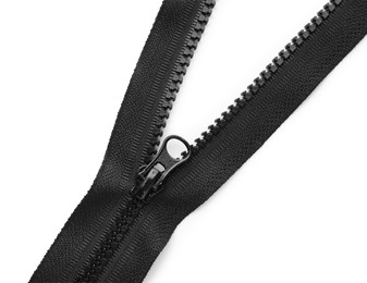 Photo of Black zipper on white background, top view