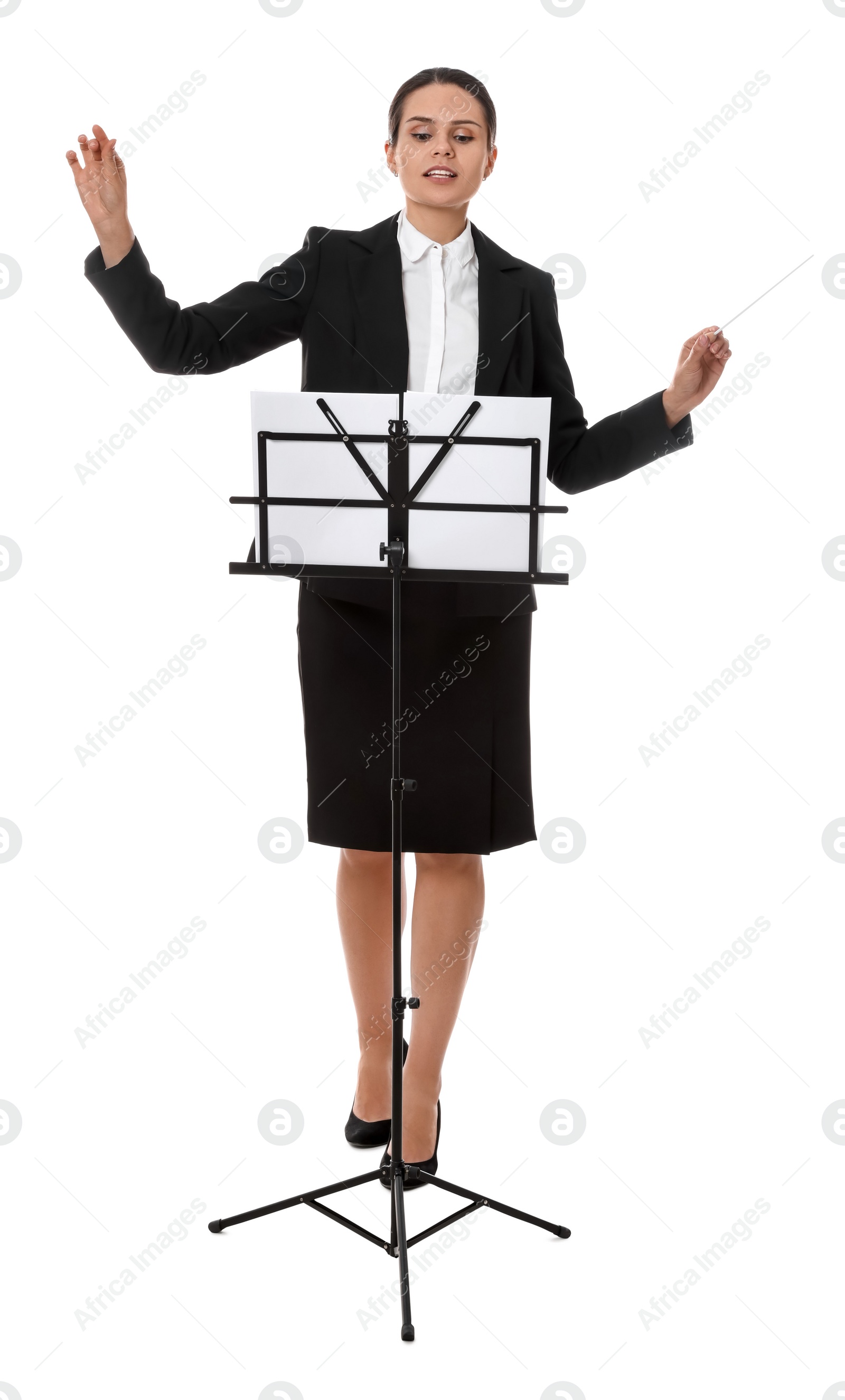 Photo of Professional conductor with baton and note stand on white background