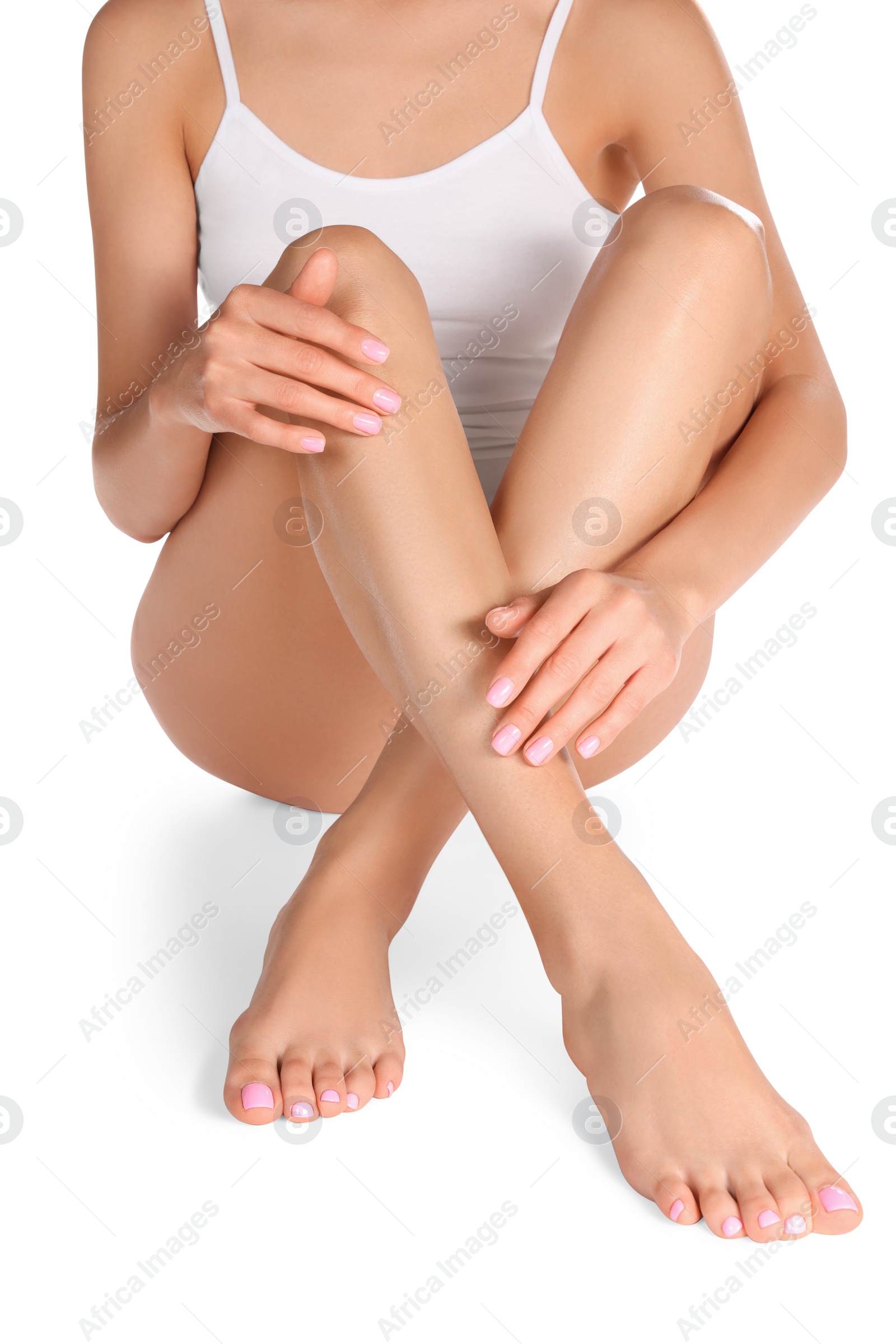 Photo of Woman with beautiful long legs on white background, closeup