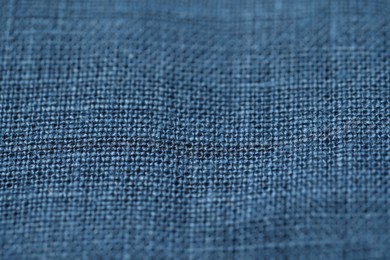 Photo of Texture of blue fabric as background, closeup
