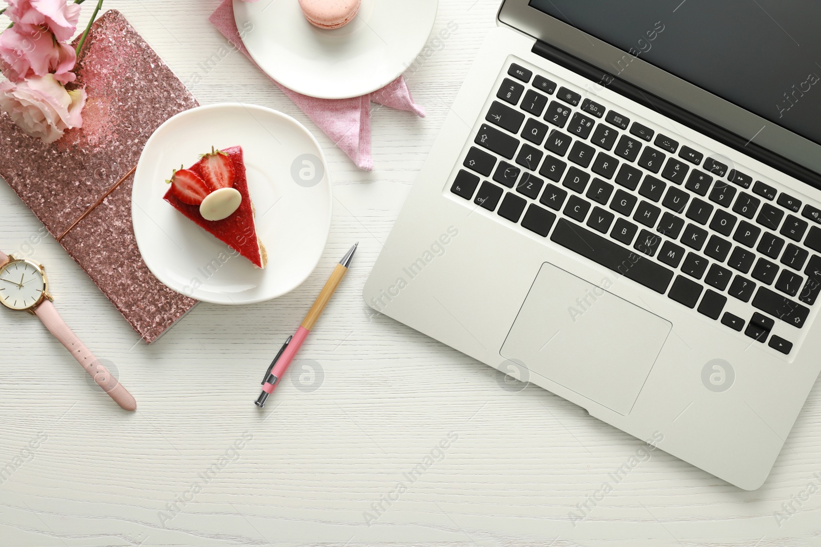 Photo of Flat lay composition with laptop on white wooden table. Fashion blogger