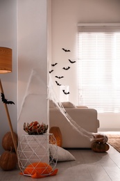 Photo of Modern room decorated for Halloween. Festive interior