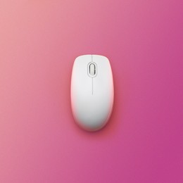 Image of Modern wireless computer mouse on pink background, top view