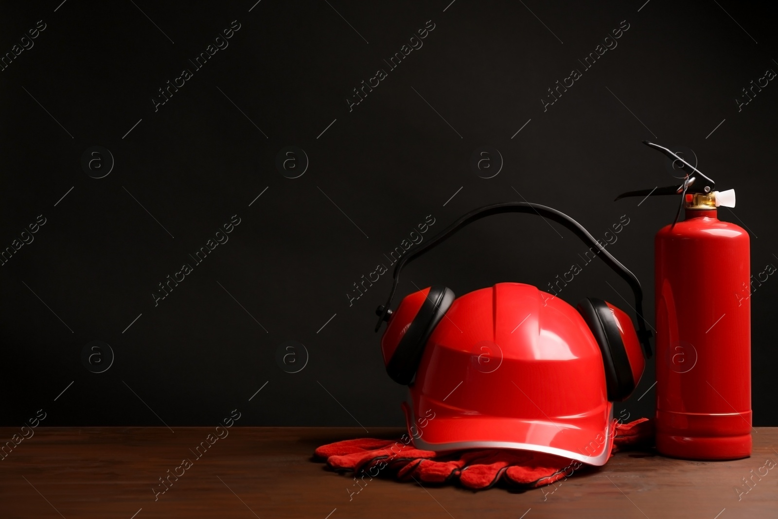 Photo of Composition with safety equipment on table. Space for text