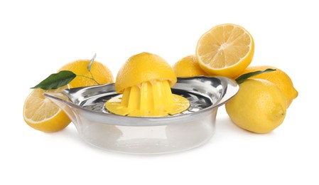 Squeezer and fresh lemons on white background